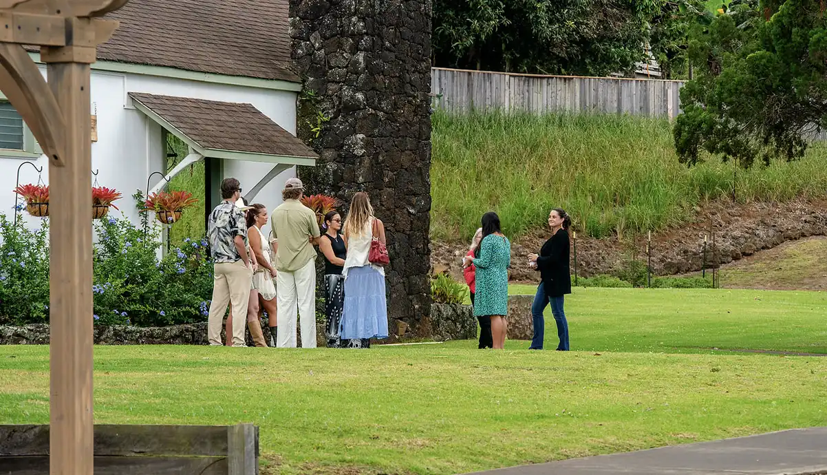 Guests on the historic walking tour on the estate lawn