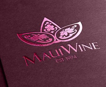 MauiWine logo foil-stamped in pink on burgundy paper